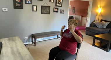 Senior working out from home using Virtual Y