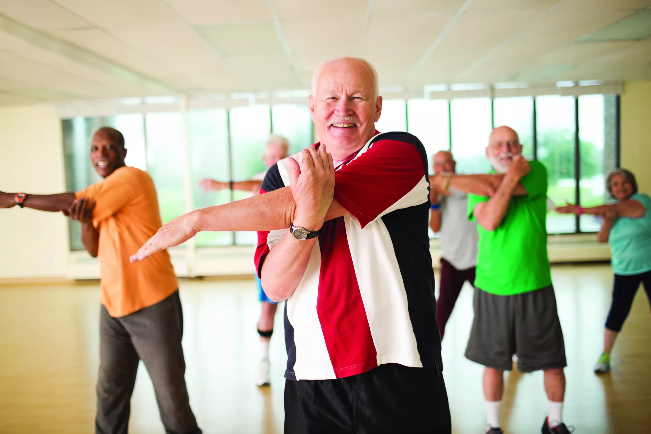 Group of older adults in a fitness class