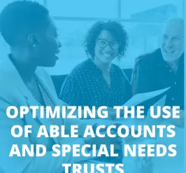 People sitting around a table discussing ABLE accounts