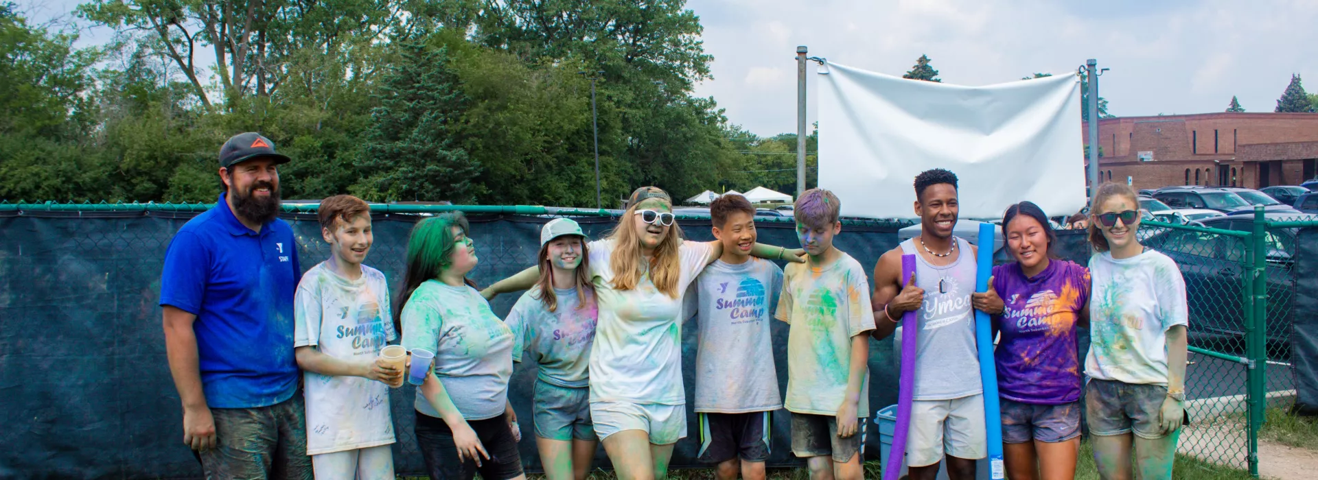 Picture of Ricky Gonzalez and other camp leaders after the color run